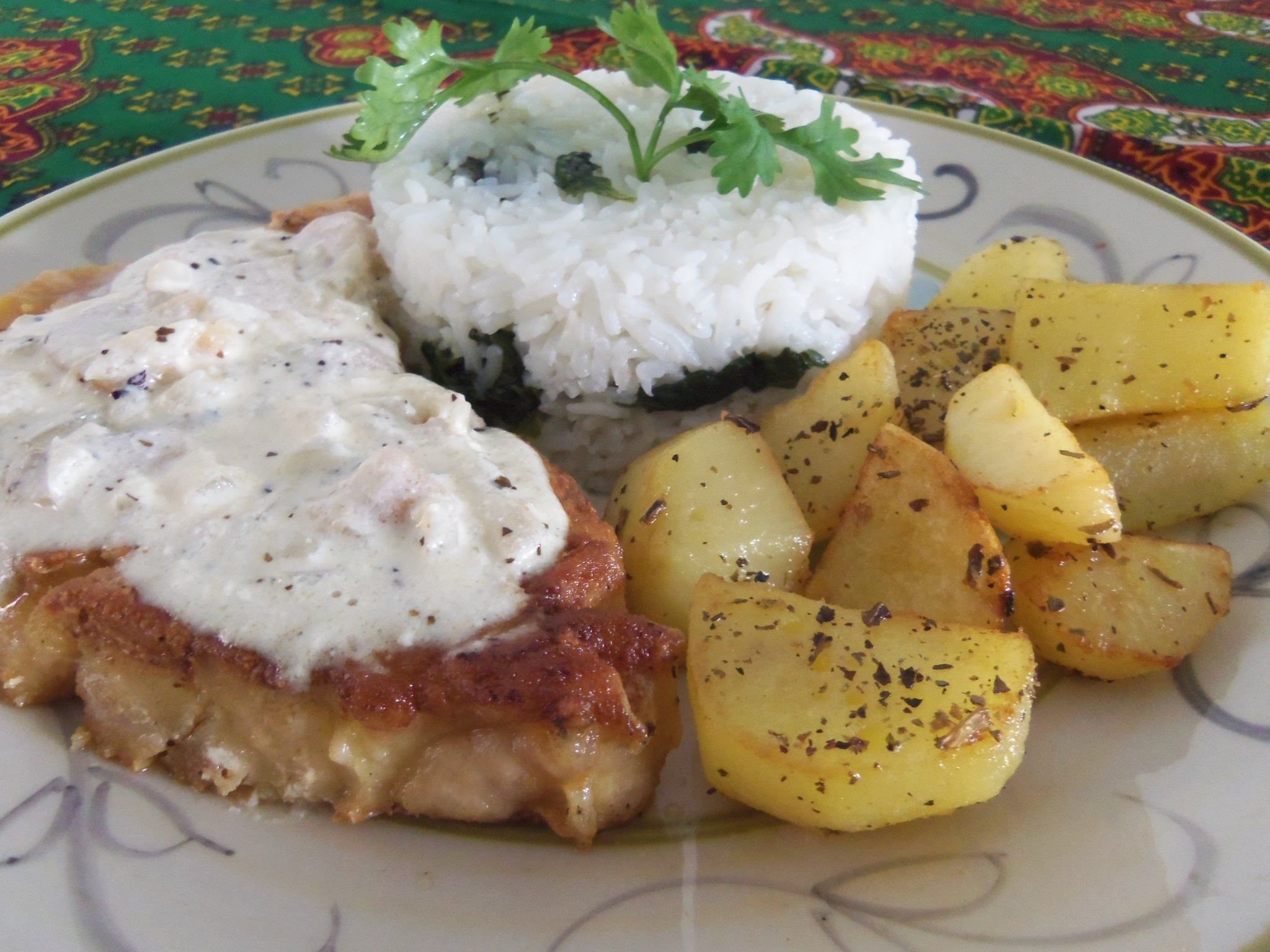 Filé de peixe ao molho de sidra e batatas à doré