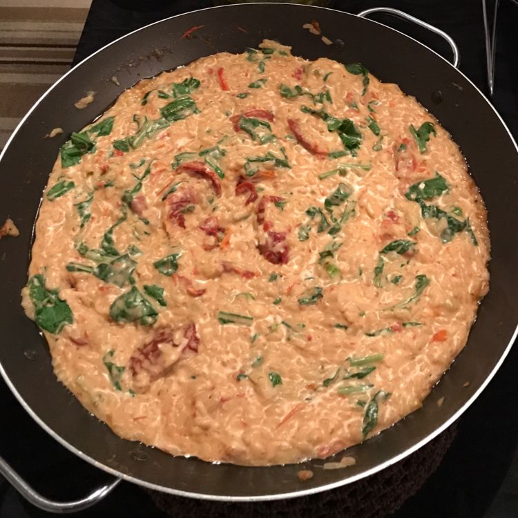 Risoto de tomate seco com rúcula